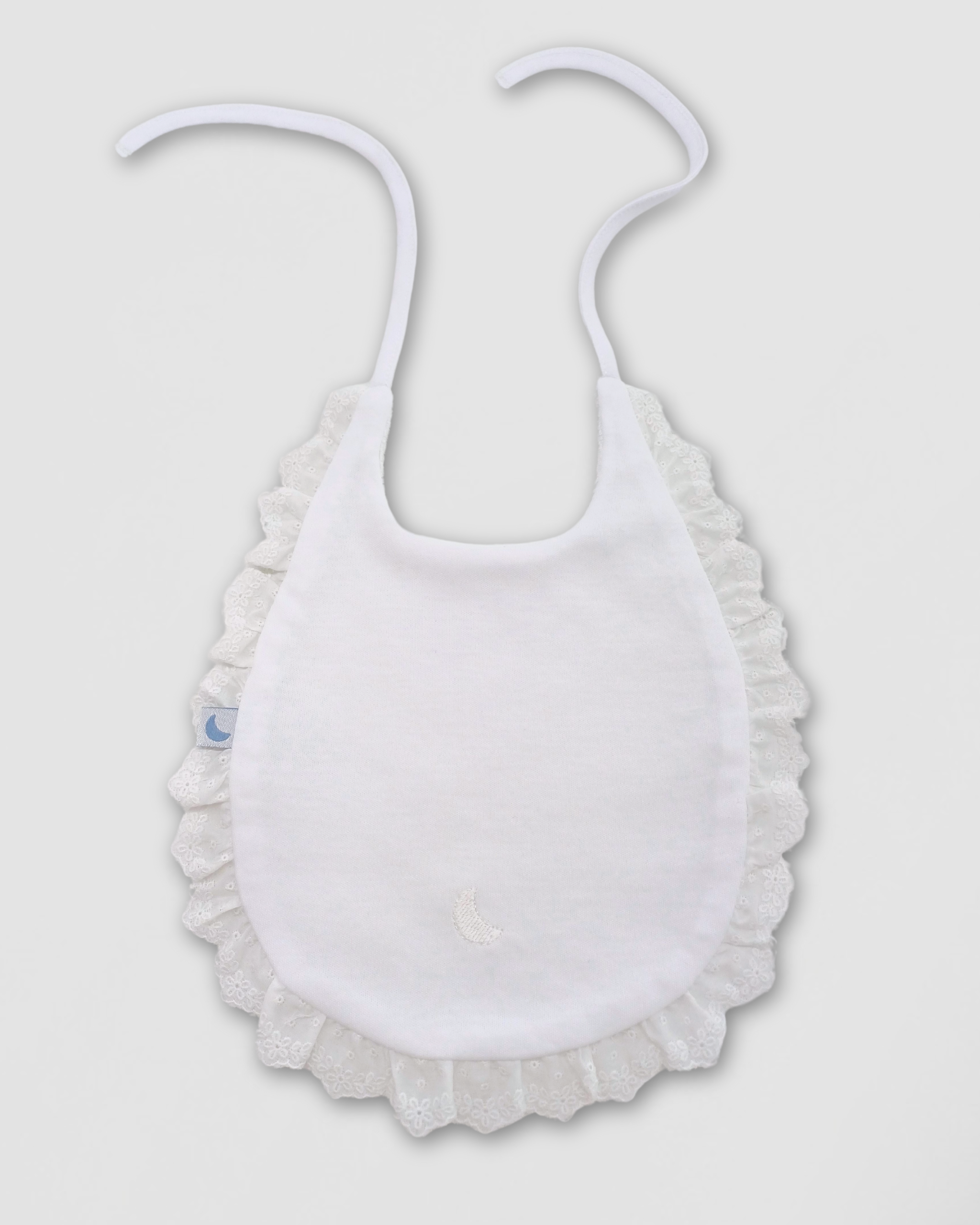 Bavoir à bandes brodées