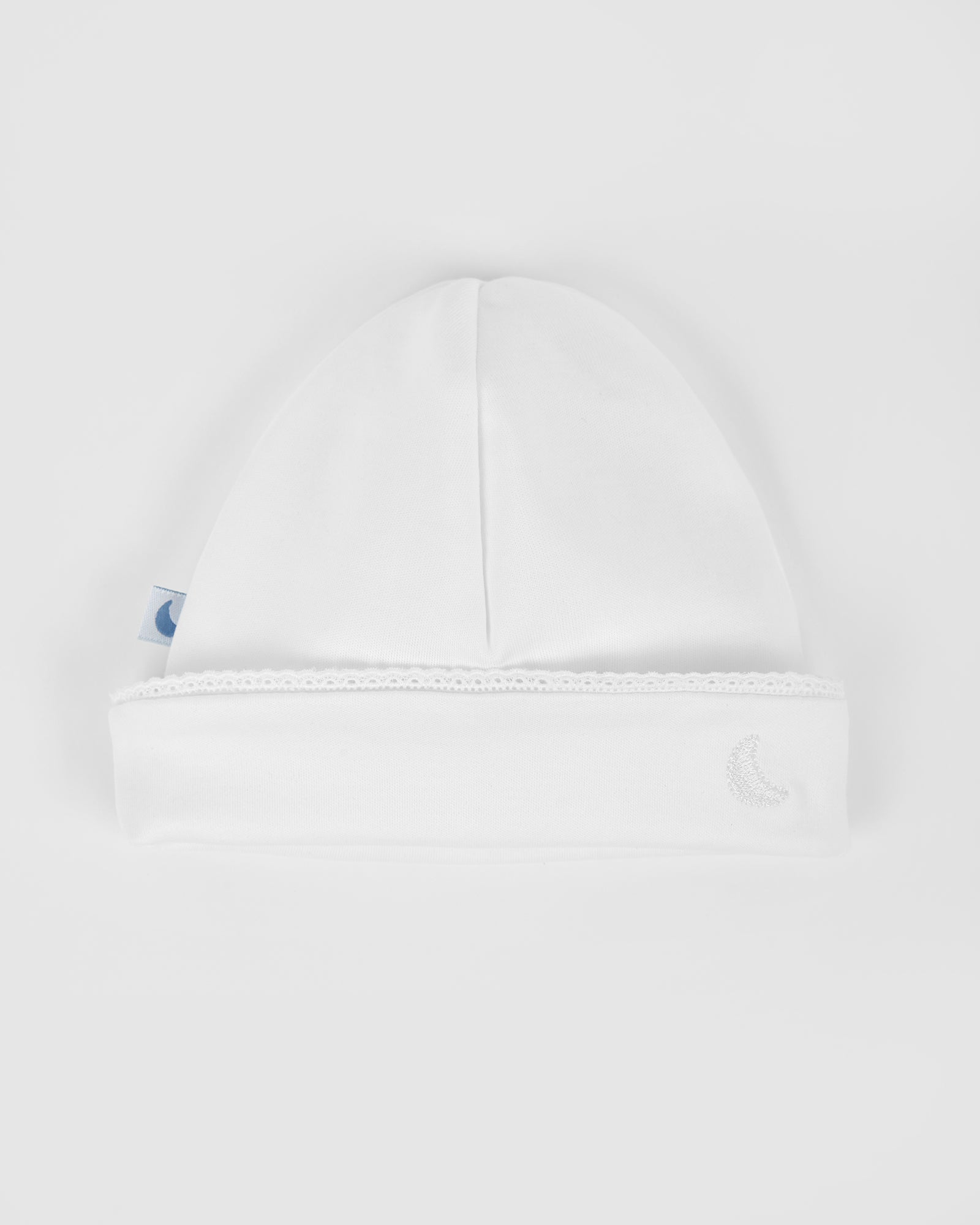 Bonnet bébé à rayures blanches brodées