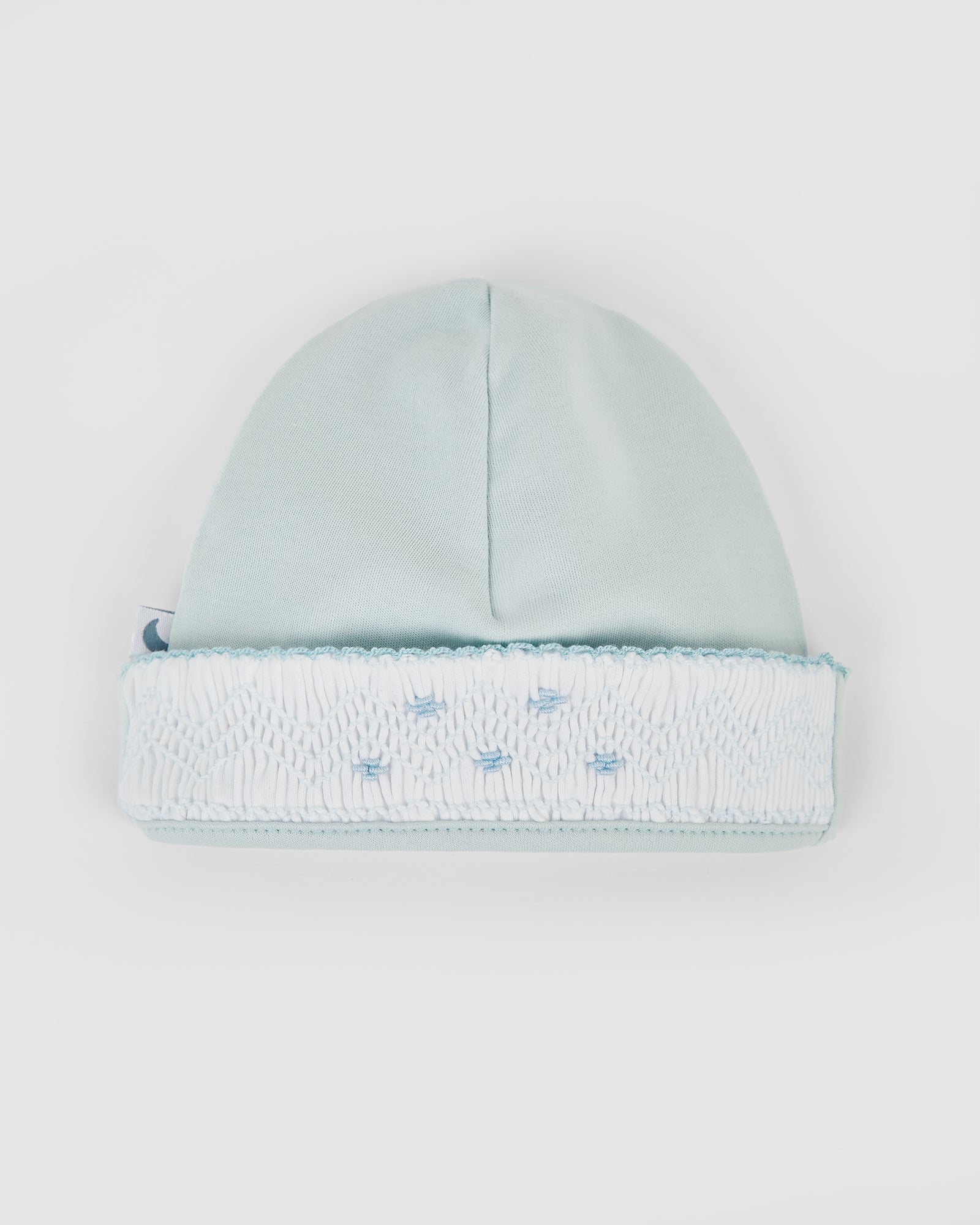 Bonnet bébé bleu à smocks