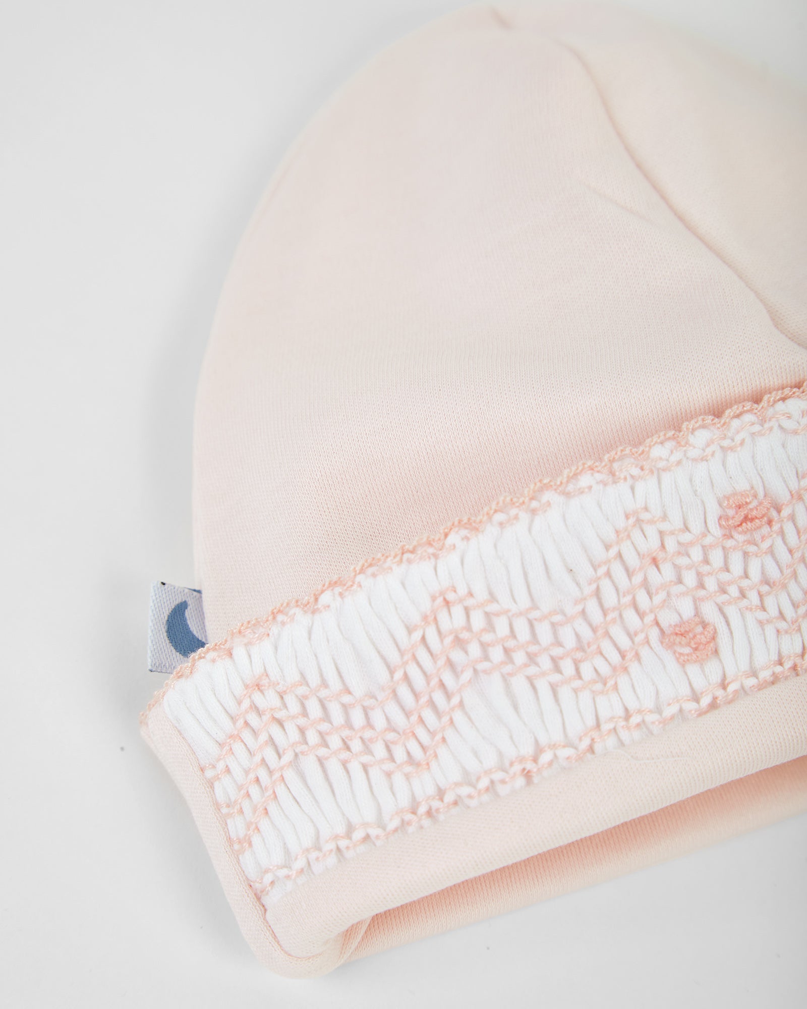 Bonnet bébé rose à smocks