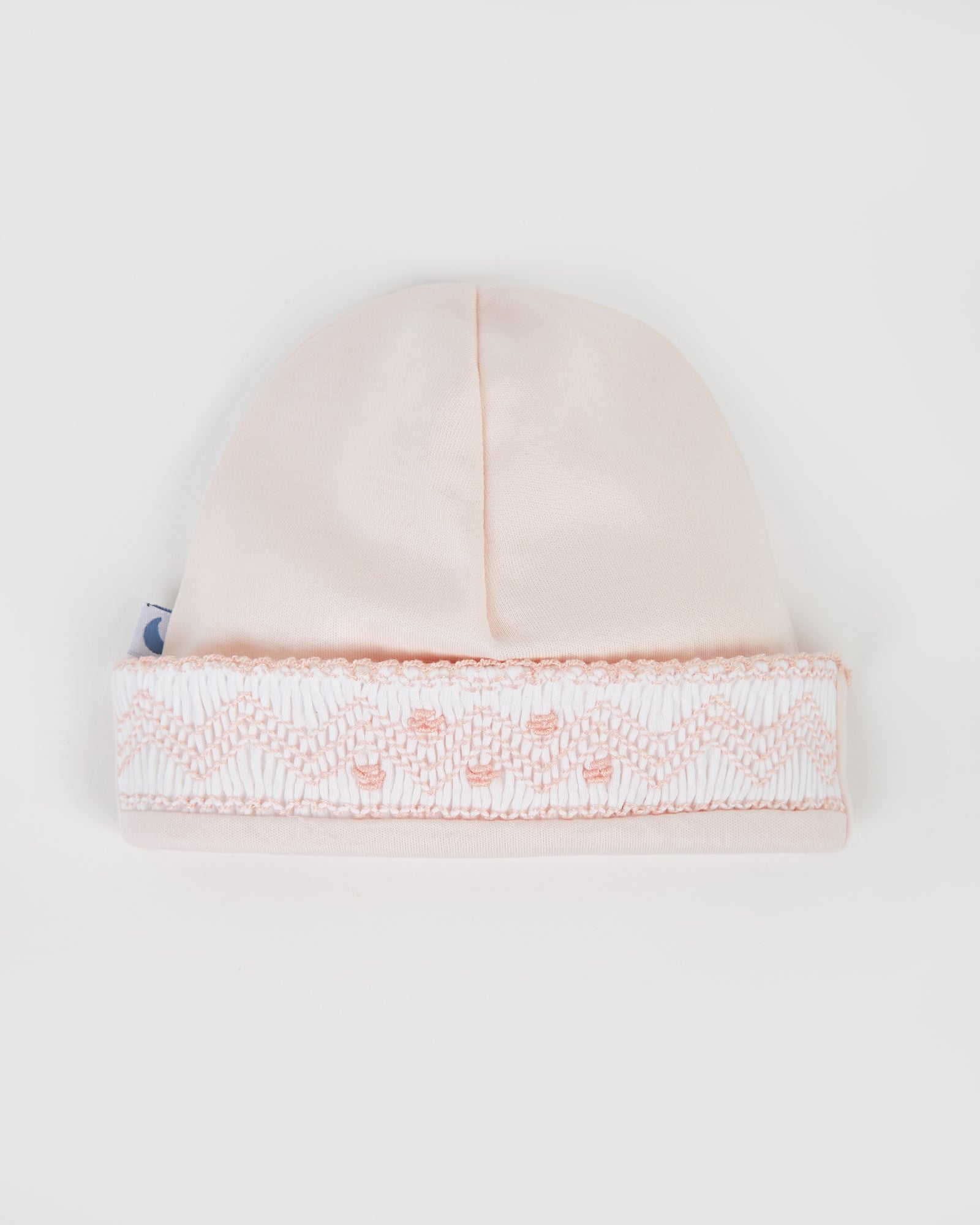 Bonnet bébé rose à smocks