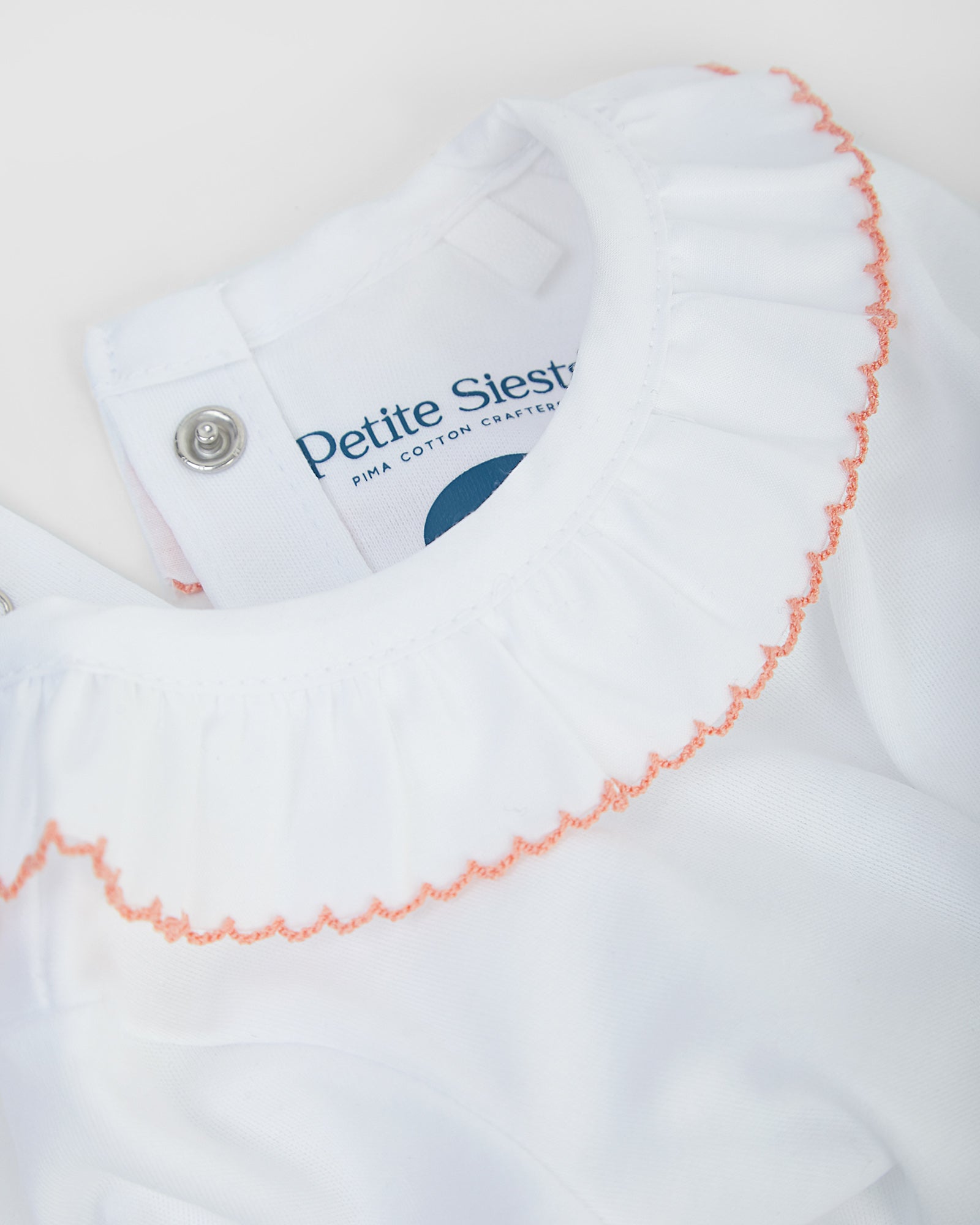 Body Cuello Volante Rosa Coral