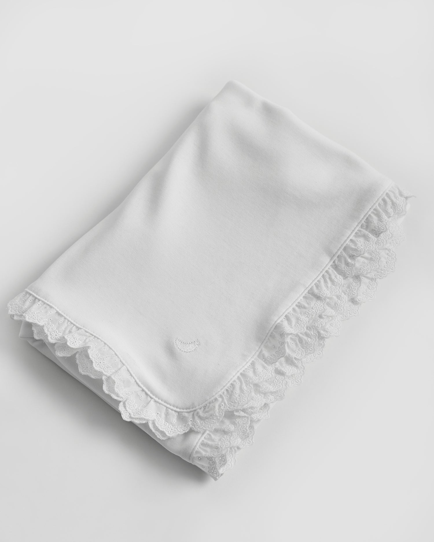 Bande brodée pour emmailloter bébé