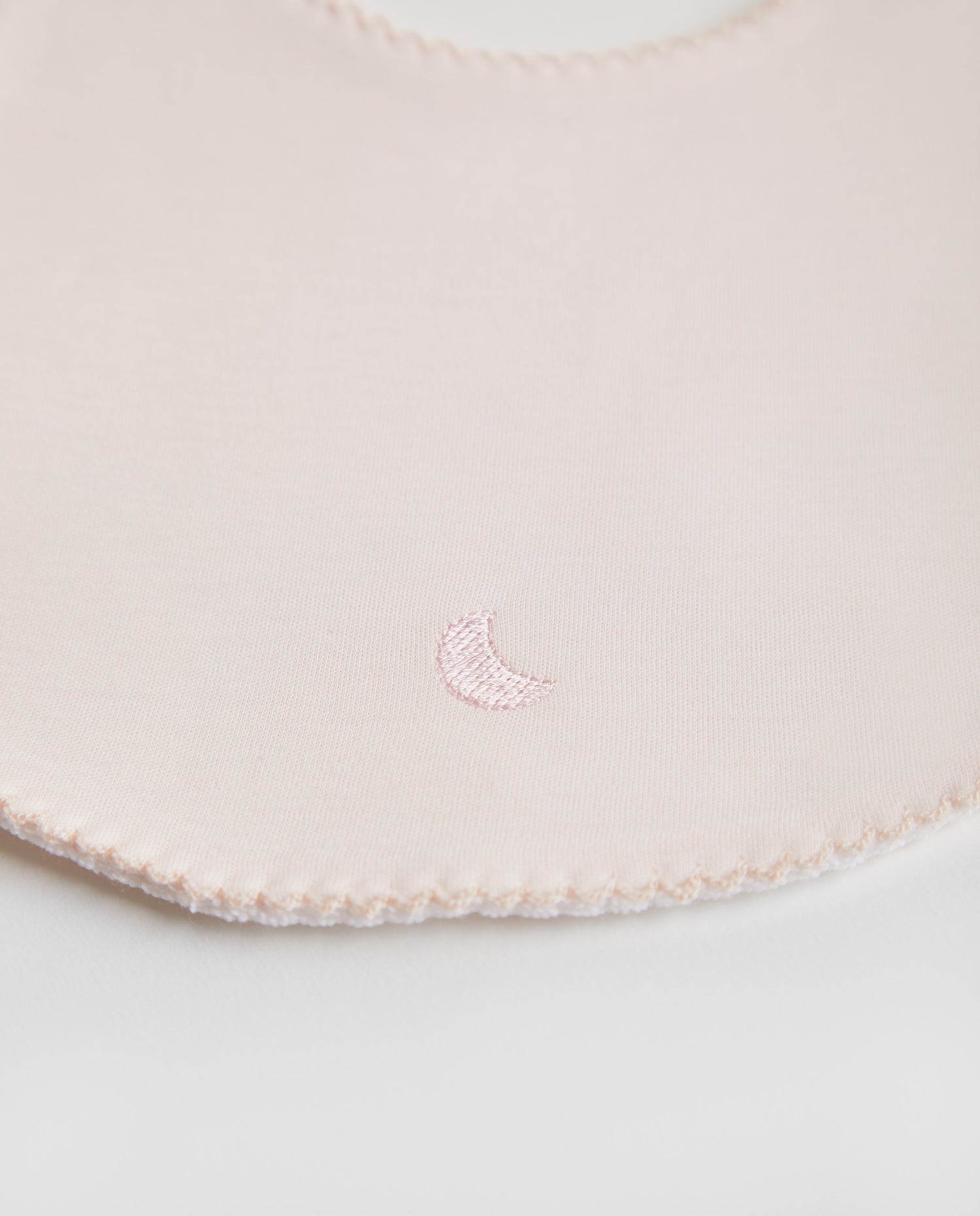 Bavoir rose