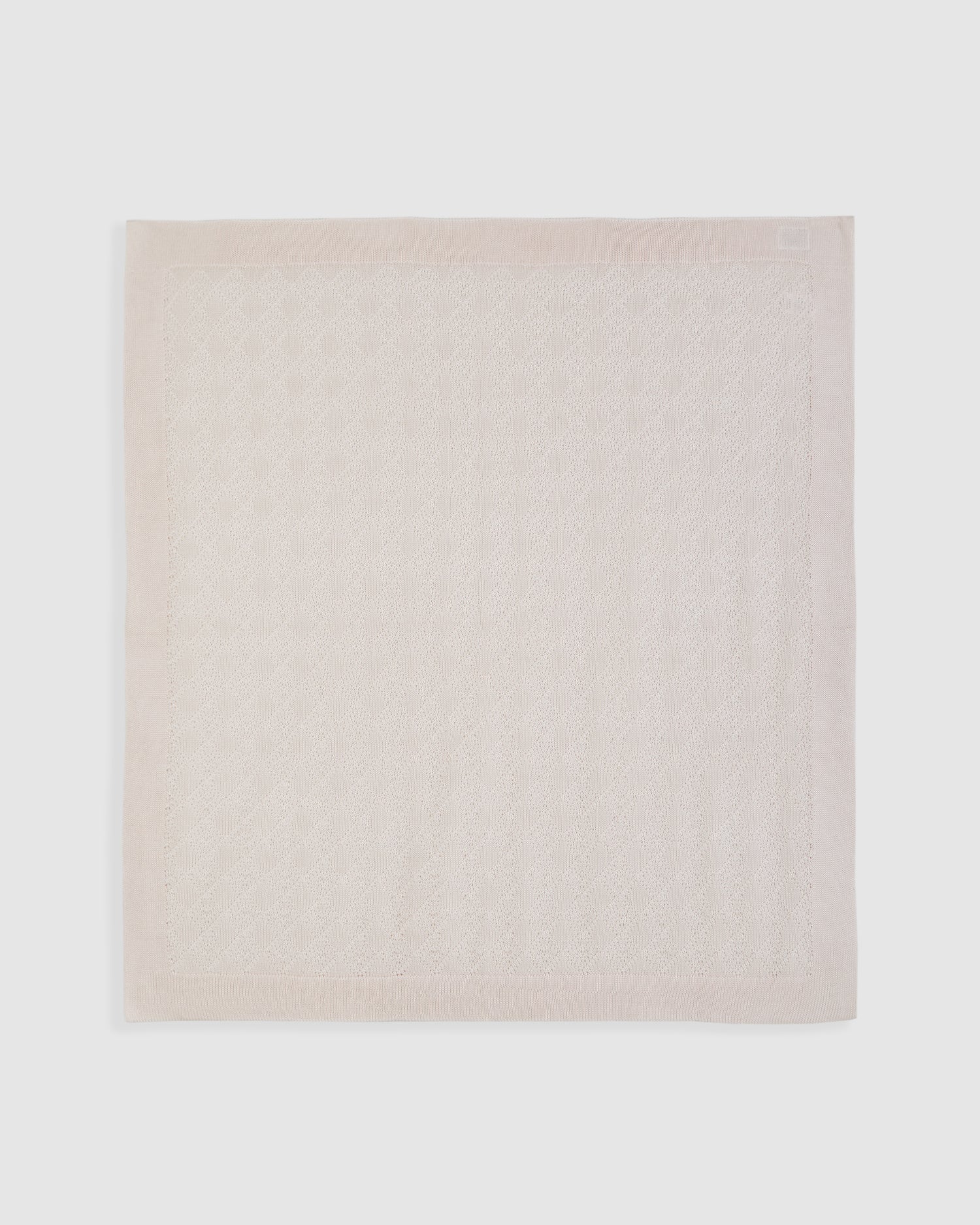 Couverture en coton perlé rose 